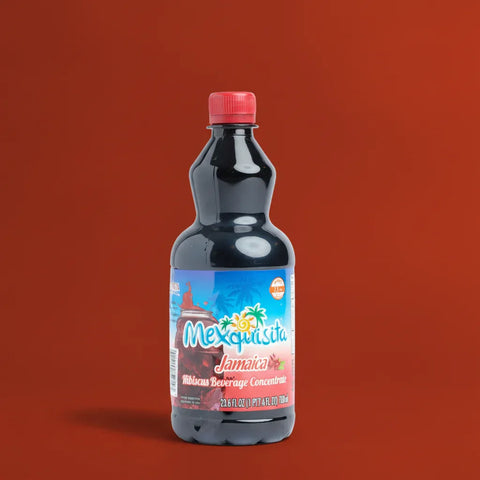 Bottle of Mexiquisita Hibiscus beverage concentrate on a red background
