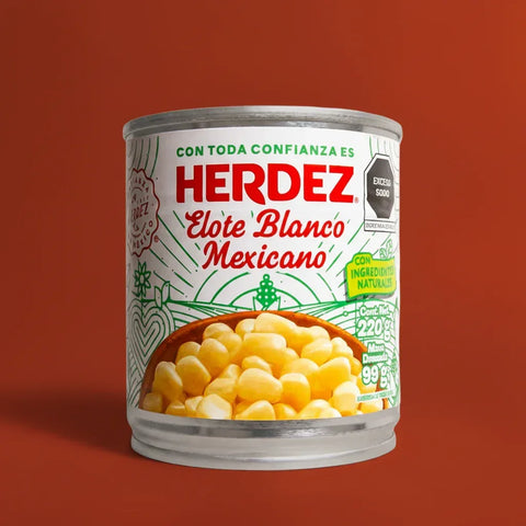 Can of Herdez Elote Blanco Mexicano on a red background