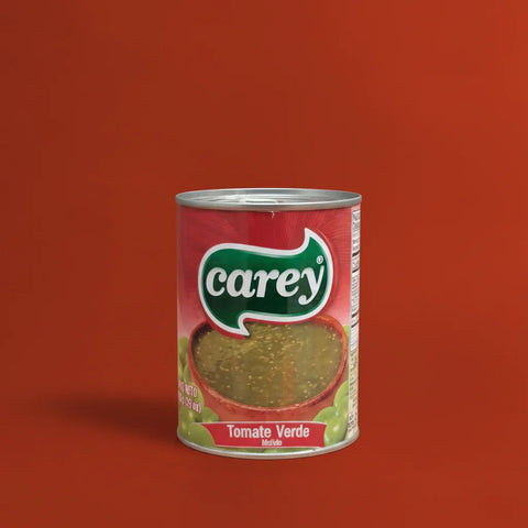 Can of Carey crushed green tomatillos on a red background