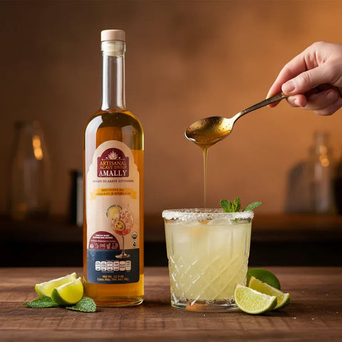 Person pouring agave syrup into a cocktail 