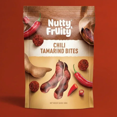 Packaging of Nutty & Fruity Chili Tamarind Bites on a red background