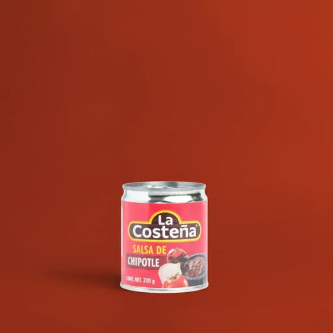 Can of La Costena chipotle salsa on a red background