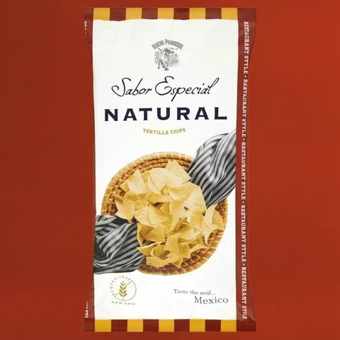 Bag of Nuevo Progreso tortilla chips packaging on a red background