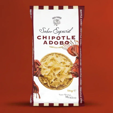 A package of Nuevo Progresol Chipotle Adobo tortilla chips on a red background