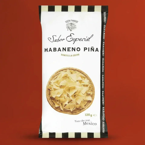 Packaging of Nuevo Progreso Habaneno Piña tortilla chips on a red background