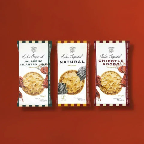 Three packages of Sabor Especial tortilla chips (left to right, Jalapeno, Natural, Chipotle) on a red background