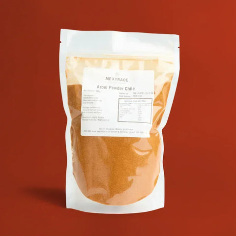 Package of De Arbol Powder on a red background