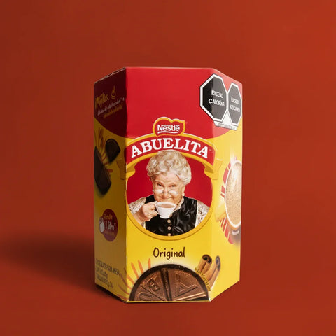 Nestle Abuelita chocolate packaging on a red background