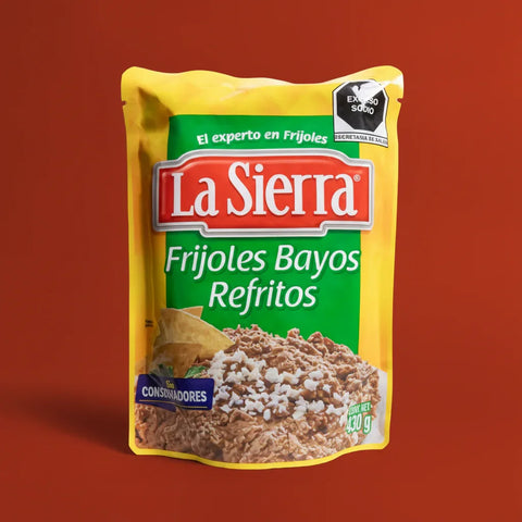 La Sierra frijoles bayos refritos package on a red background