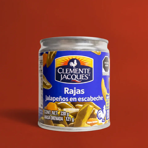 Can of Clemente Jacques Sliced Jalapeños on a red background