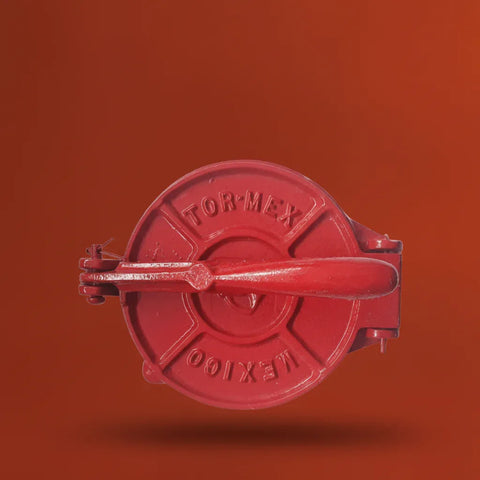 Red tortilla press with 'Tor-mex Mexico' branding on a red background