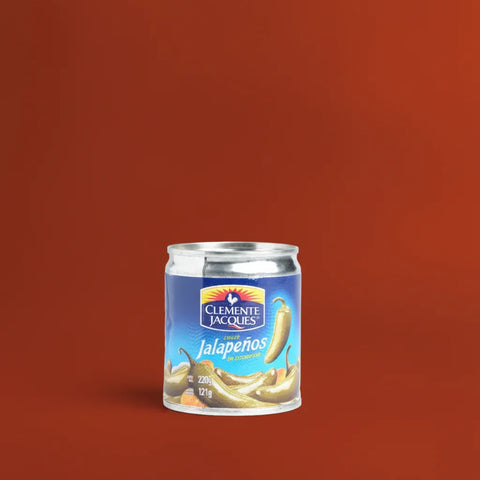 Can of Clemente Jacques jalapeños on a red background